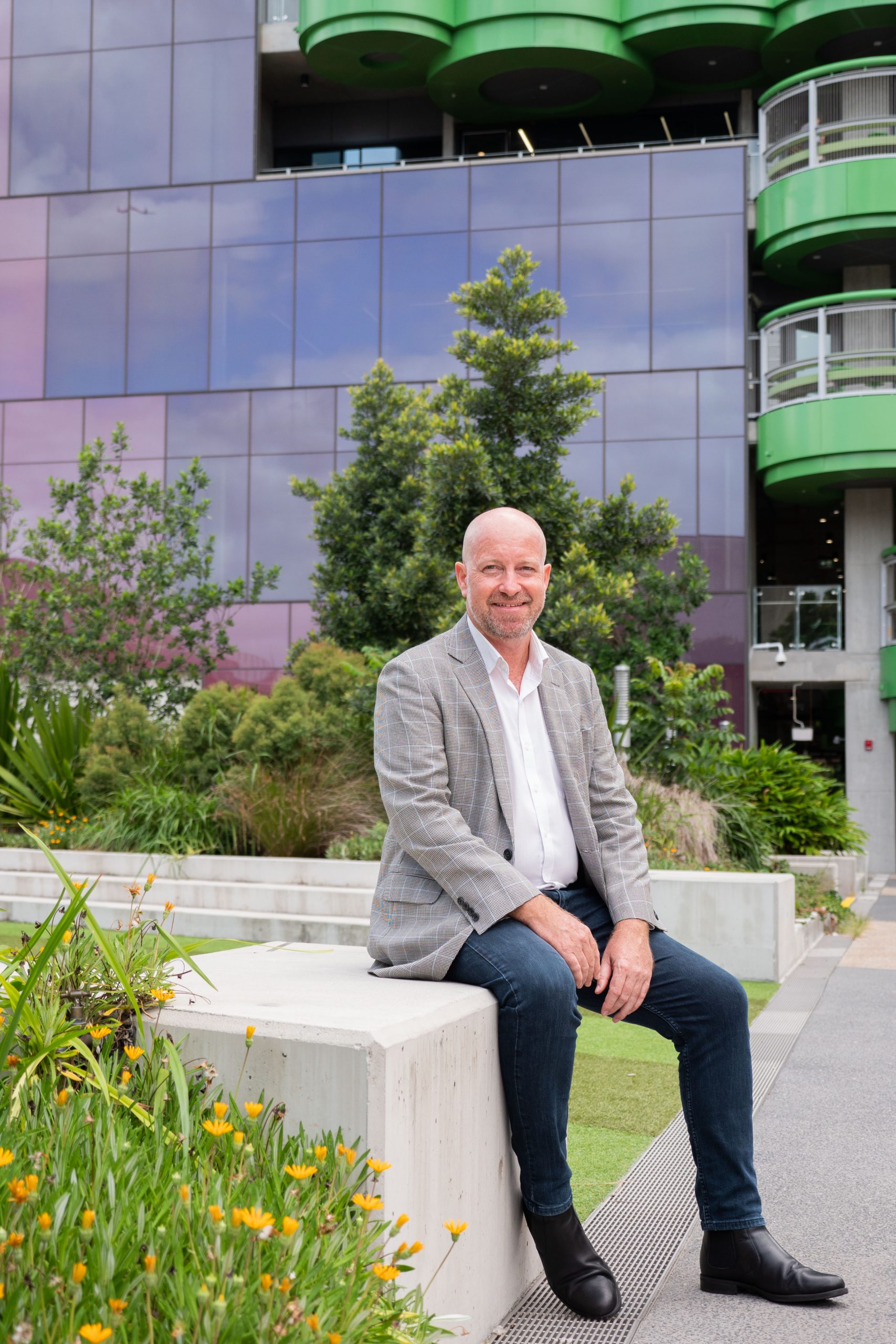 Prof Darren Martin In Front Of UQ Andrew N. Liveris Chem Eng Bldg Scaled